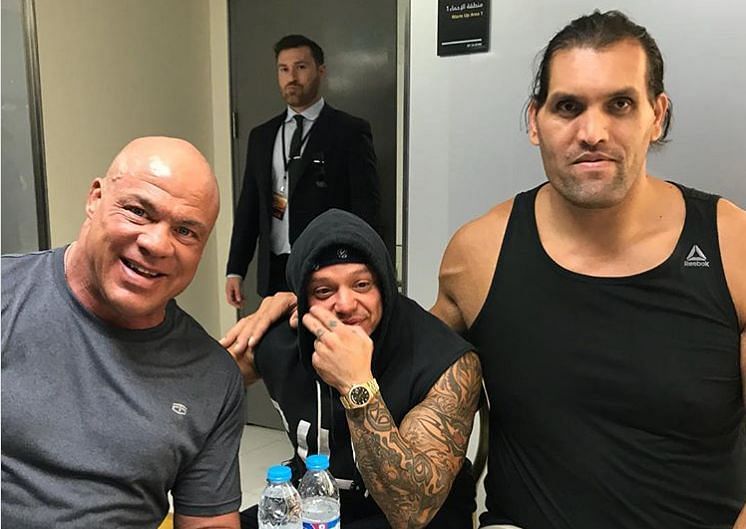Kurt Angle and The Great Khali with Rey Mysterio unmasked