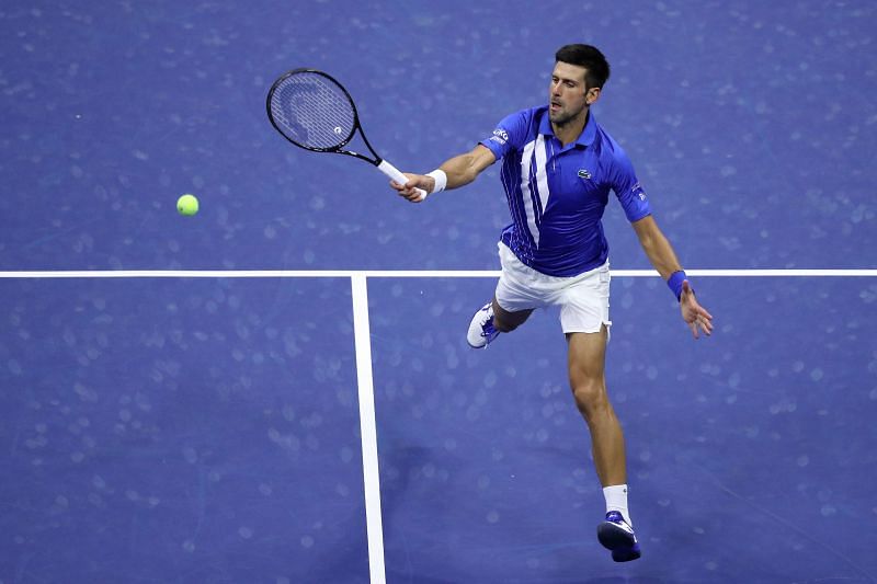 Novak Djokovic plays a volley at 2020 US Open