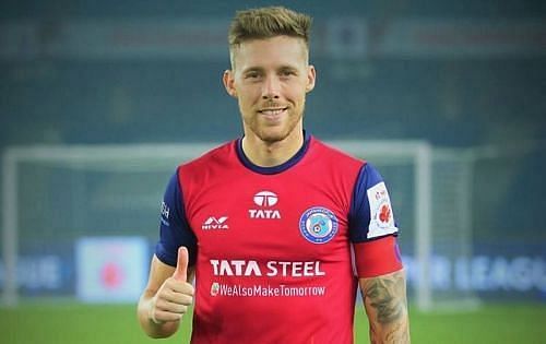 Tiri in a Jamshedpur FC shirt.