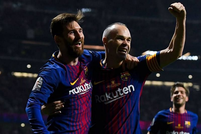 Lionel Messi and Andres Iniesta (centre)