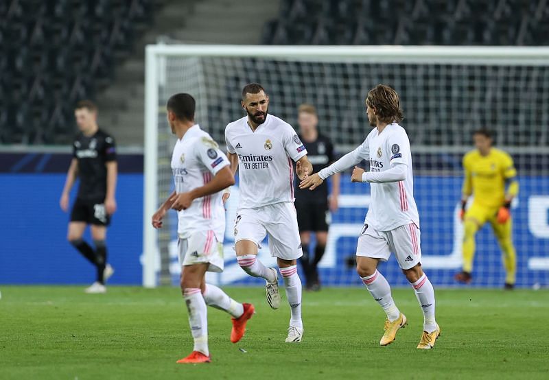 Karim Benzema scored the first of two late Real Madrid goals