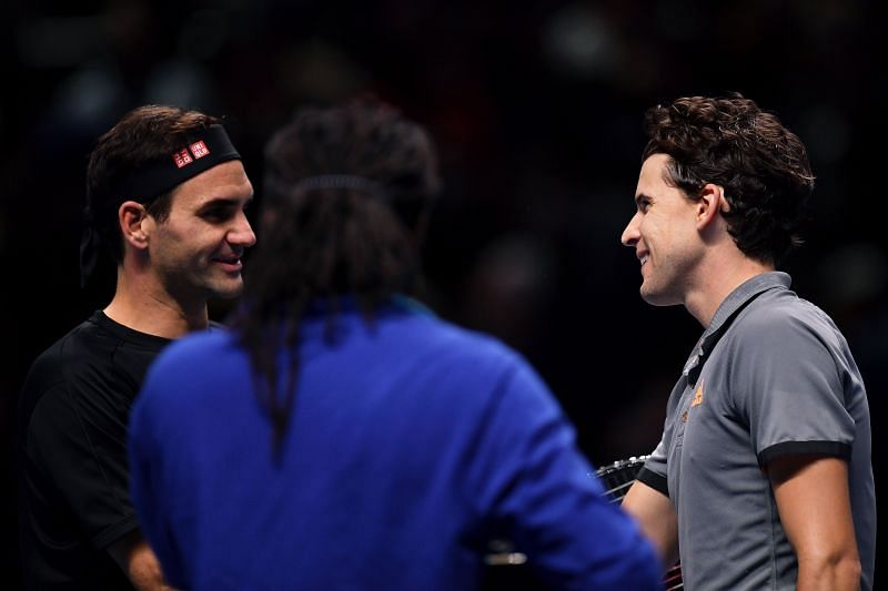 Dominic Thiem with Roger Federer