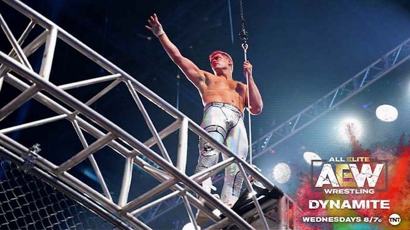 Cody stands on top on the cage in the first steel cage match on AEW Dynamite