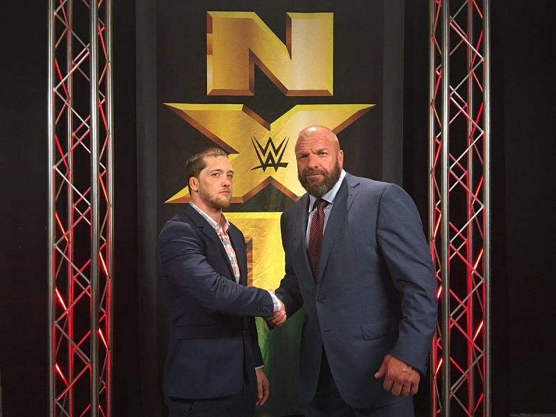 Kyle O&#039;Reilly with Triple H in WWE NXT