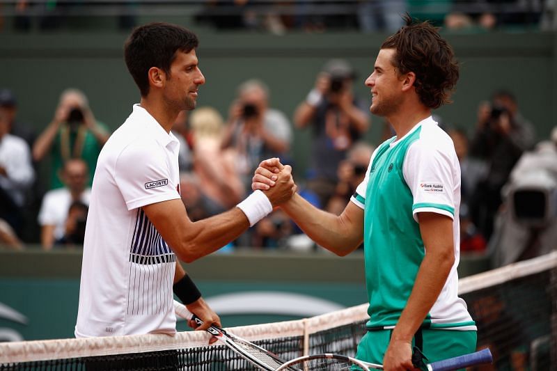 Novak Djokovic and Dominic Thiem greet each other at the net ATP Masters Series Madrid