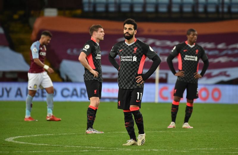 Liverpool players wore a dejected look after the hammering at Aston Villa.