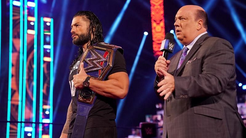 Paul Heyman with Roman Reigns