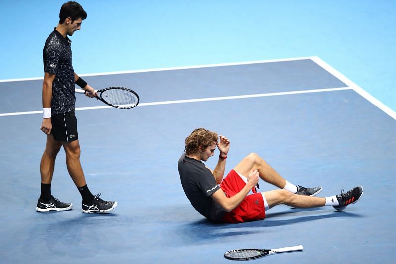 Novak Djokovic heads to congratulate Alexander Zverev after losing to him