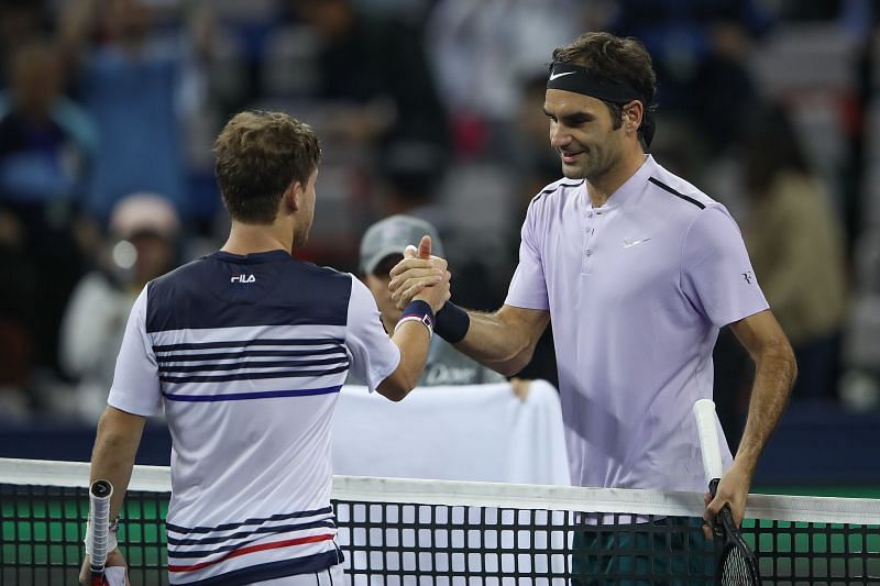 Diego Schwartzman (L) and Roger Federer at the 2017 Shanghai Rolex Masters