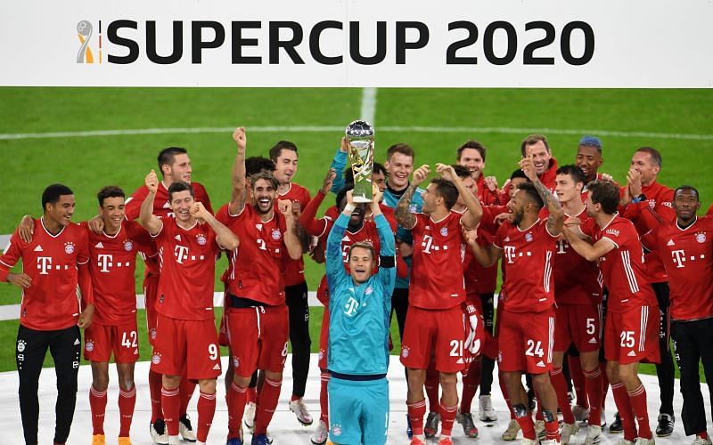 Bayern Munich players celebrate as Manuel Neuer lifts the German Supercup after beating Borussia Dortmund