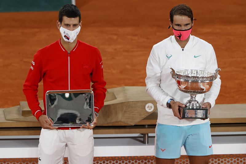 Novak Djokovic and Rafael Nadal with their respective trophies at the 2020 French Open