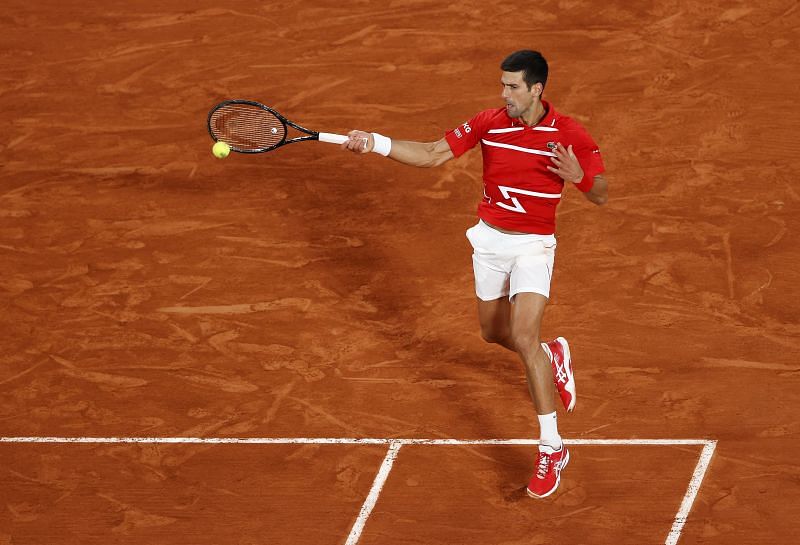 Novak Djokovic hits a forehand against Rafael Nadal during the 2020 French Open final