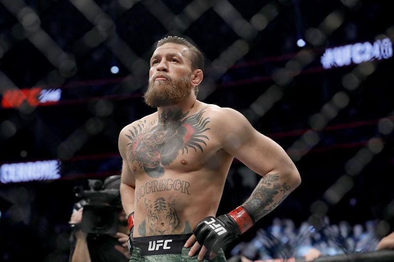 Conor McGregor reacts before taking on Donald Cerrone in their welterweight bout during UFC246