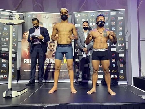 Faizan Anwar (L) poses during the weigh-in of the Rotunda Rumble IV event