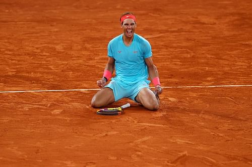  Rafael Nadal celebrates after beating Novak Djokovic at the 2020 French Open