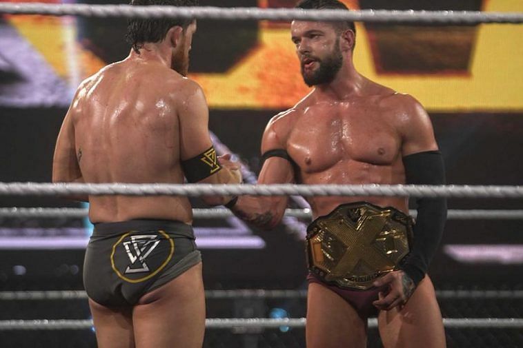 Balor and O&#039;Reilly with a show of sportsmanship following their match at NXT TakeOver: 31