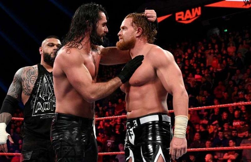 Seth Rollins and Murphy about to hug it out