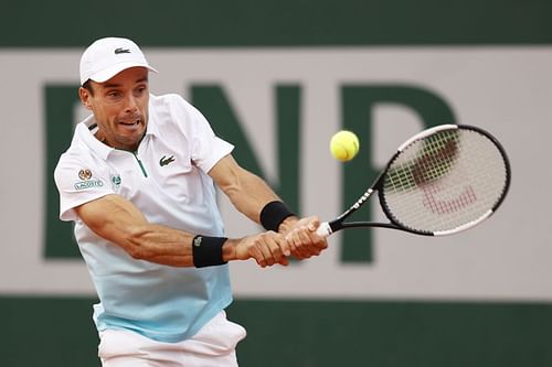 Roberto Bautista Agut during his second round match against Attila Balazs at the French Open