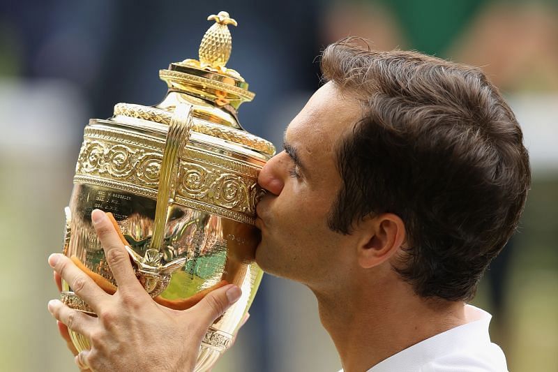 Roger Federer with the Wimbledon trophy after winning the title in 2017 