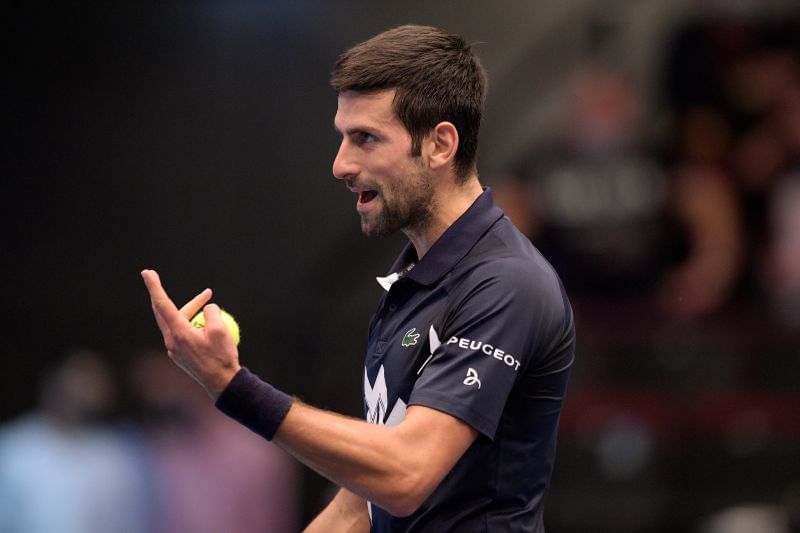 Novak Djokovic reacts in his match against Lorenzo Sonego