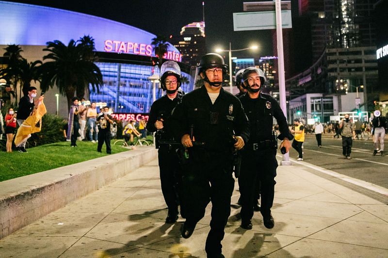 Fans celebrate in Los Angeles after LA Lakers&#039; win in the 2020 NBA Finals.