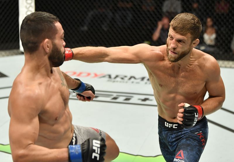 Calvin Kattar punches Dan Ige in their featherweight fight