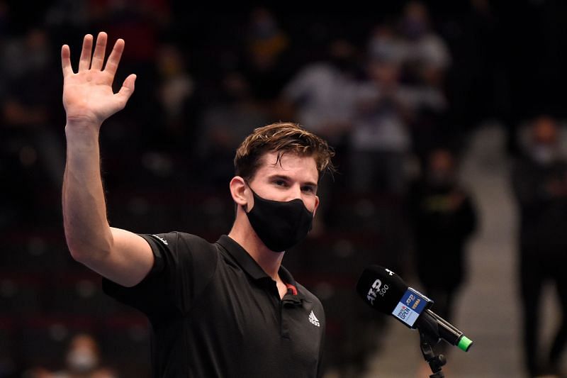 Dominic Thiem waves to fans after winning his match against Vitaliy Sachko in Vienna, Austria