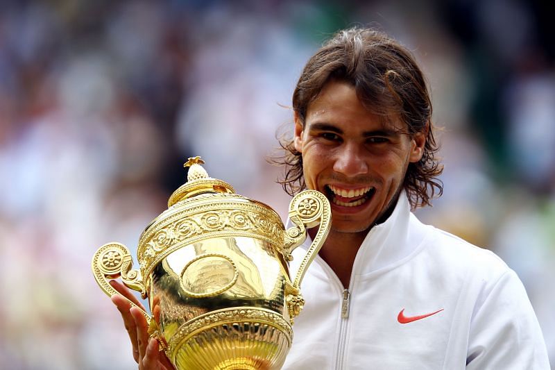 Rafael Nadal holds the Championship trophy after winning the Wimbledon title in July 2010
