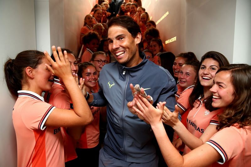 Rafael Nadal with ball kids at the 2019 French Open