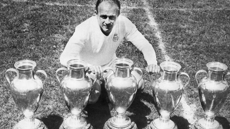 Alfredo Di Stefano poses with his five European Cup trophies won with Real Madrid.