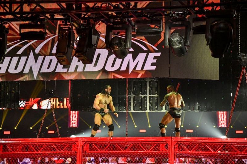 Drew McIntyre and Randy Orton on top of the cell