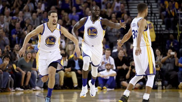 Klay Thompson, Draymond Green and Stephen Curry for the Golden State Warriors