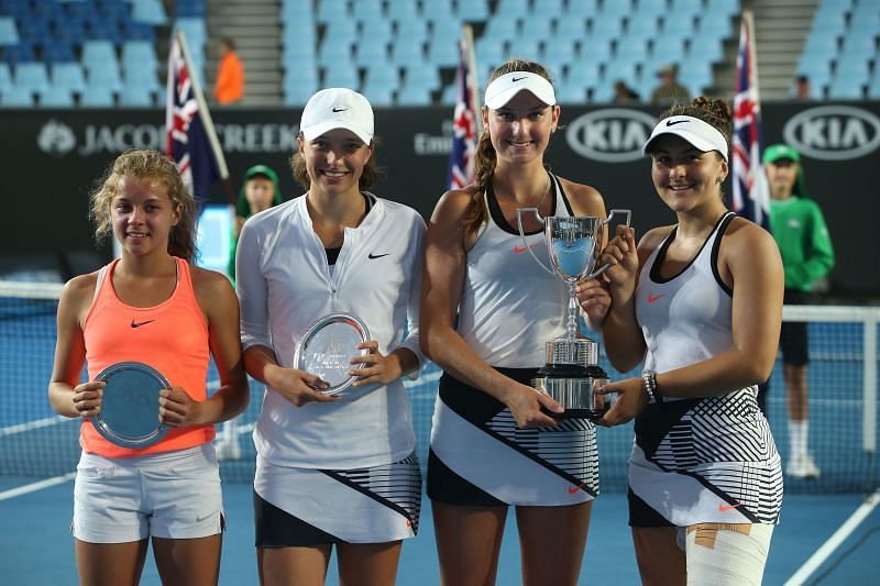 Iga Swiatek (second from left) and Bianca Andreescu (extreme right) during their junior days