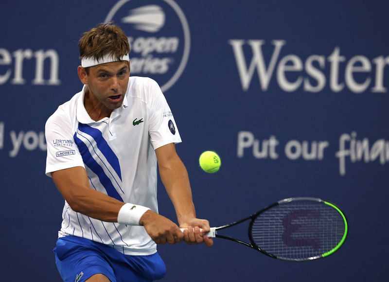 Filip Krajinovic plays a backhand