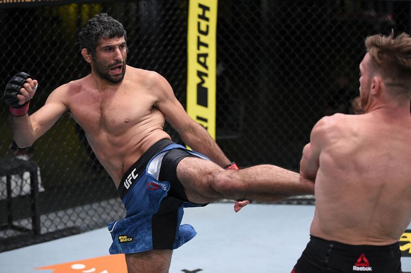 Beneil Dariush of Iran kicks Scott Holtzman in their lightweight fight&nbsp;