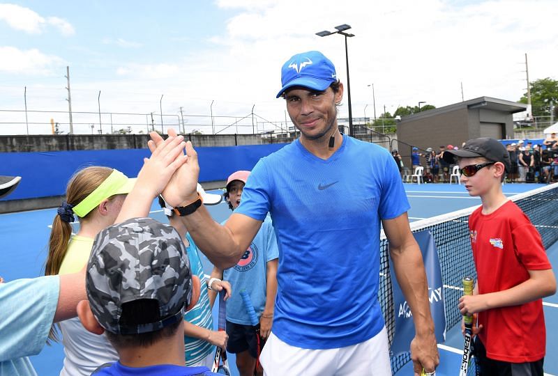 Rafael Nadal with some of his Academy students