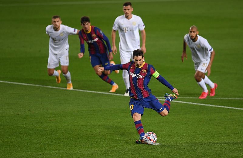 Lionel Messi converts from the spot against Ferencvaros to put Barcelona ahead in the 27th minute