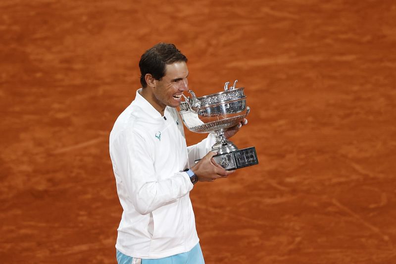Rafael Nadal with the winner&#039;s trophy at the 2020 French Open