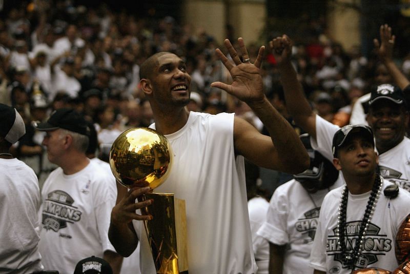 Tim Duncan celebrates one of his five NBA titles with the Spurs.