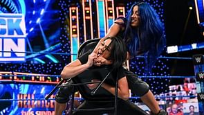 Sasha Banks' backstage reaction after forcing Bayley to sign Hell in a Cell contract