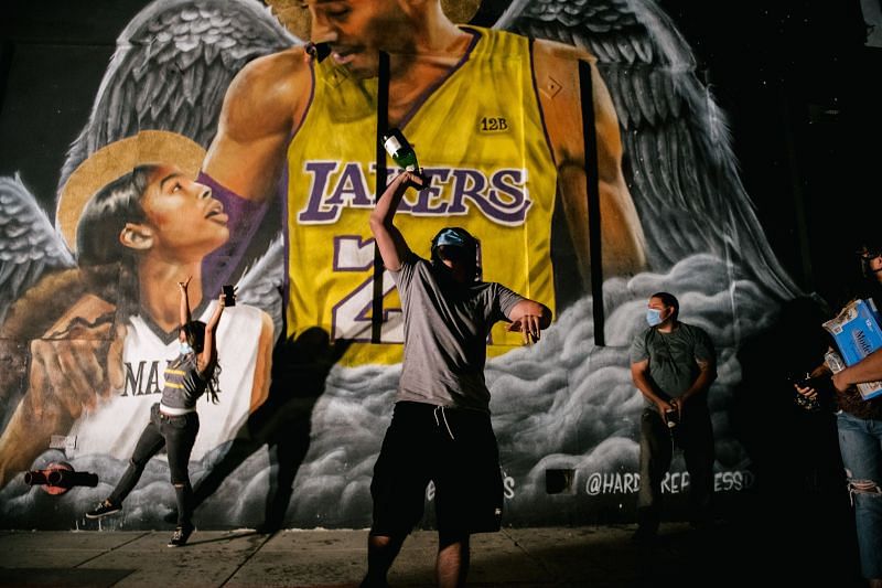 Fans celebrate in Los Angeles after LA Lakers&#039; win in the 2020 NBA Finals.