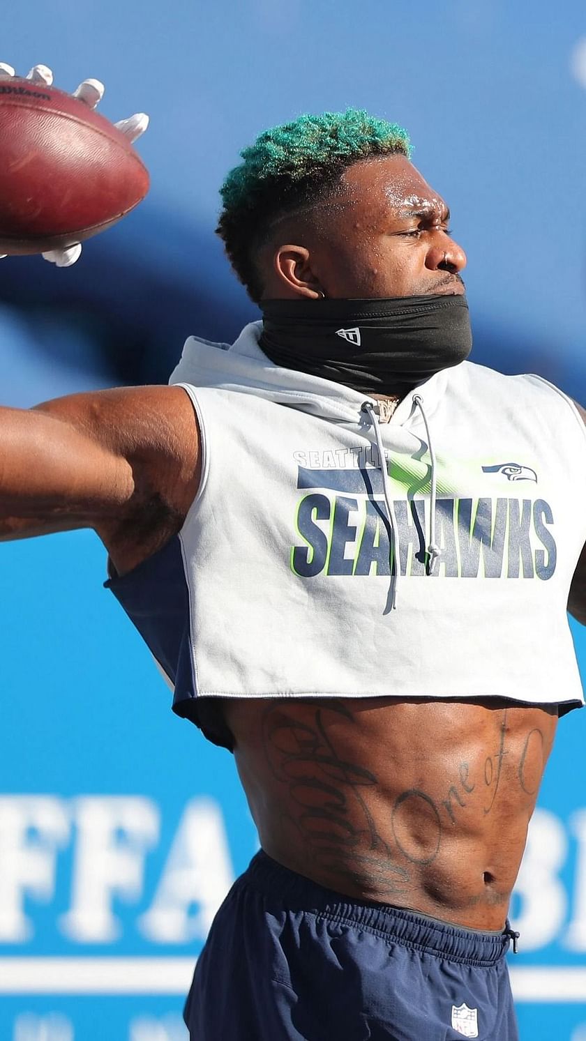 DK Metcalf of the Seattle Seahawks warms up before the game