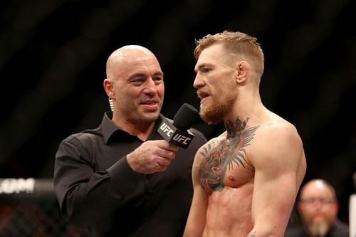 Joe Rogan with Conor McGregor inside the Octagon