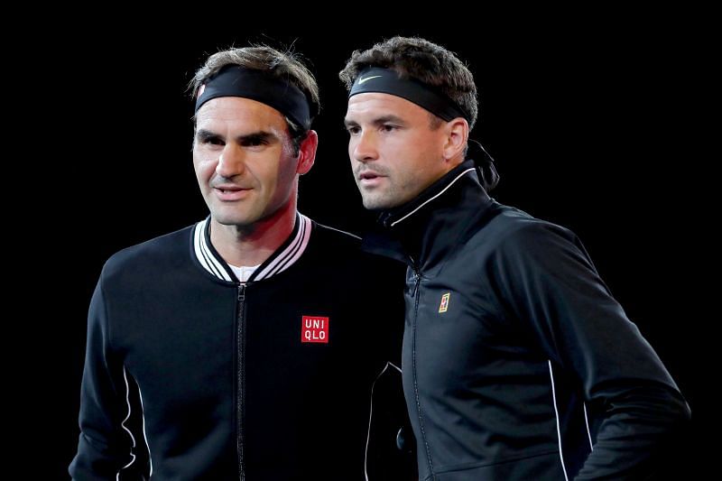 Roger Federer (L) and Grigor Dimitrov at the 2019 US Open