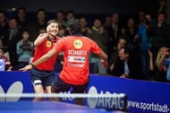 Timo Boll (left) with Sha