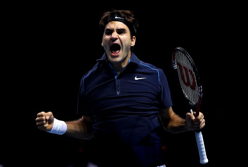 Roger Federer exults after winning the ATP Final in 2011