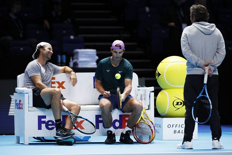 Rafael Nadal with his coaches Carlos Moya and Francisco Roig during a training session.