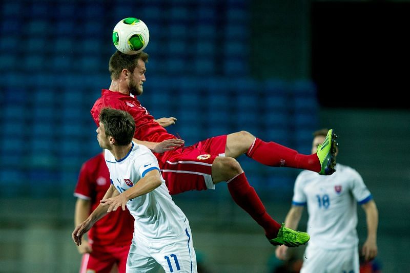 Jakub Sylvestr (in red)