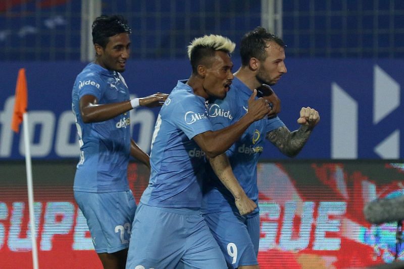 Bipin Singh and Adam Le Fondre celebrate after scoring against FC Goa