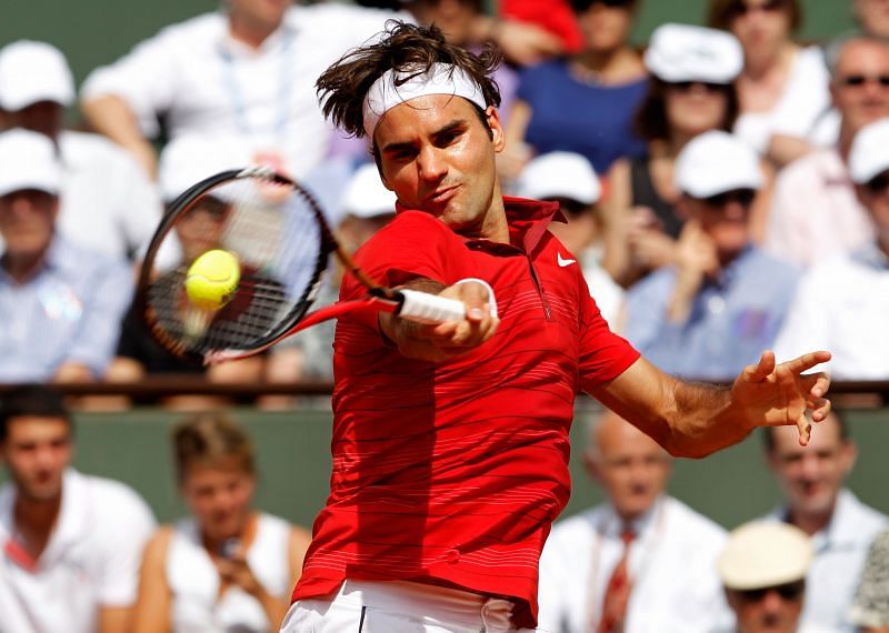 Roger Federer hits a forehand during the final against Rafael Nadal at the 2011 French Open